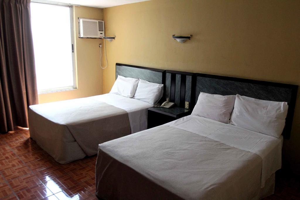 Hotel Universo Guadalajara Pokoj fotografie